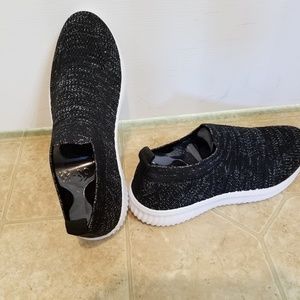 Black woven slip on sneakers